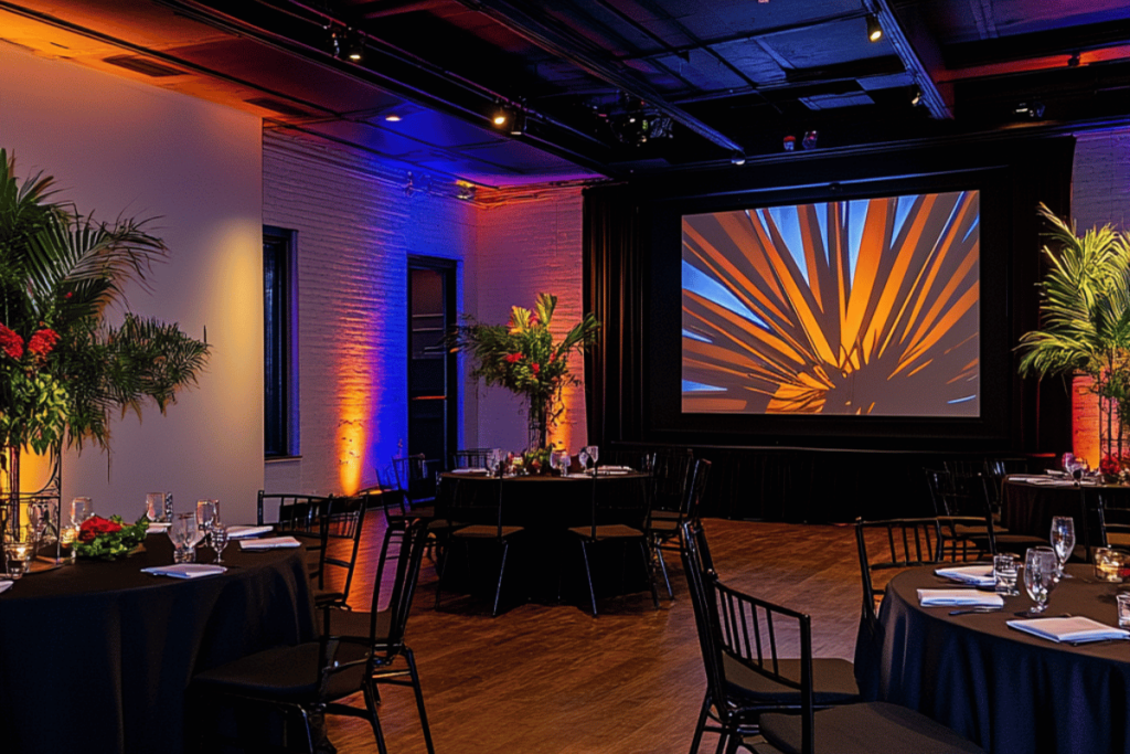 Modern and elegant AV setup at a corporate event with vibrant screen display and ambient lighting, showcasing professional staging and event management.